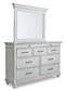 Kanwyn King Panel Bed with Storage with Mirrored Dresser, Chest and 2 Nightstands