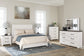Gerridan Queen Panel Bed with Mirrored Dresser and Chest